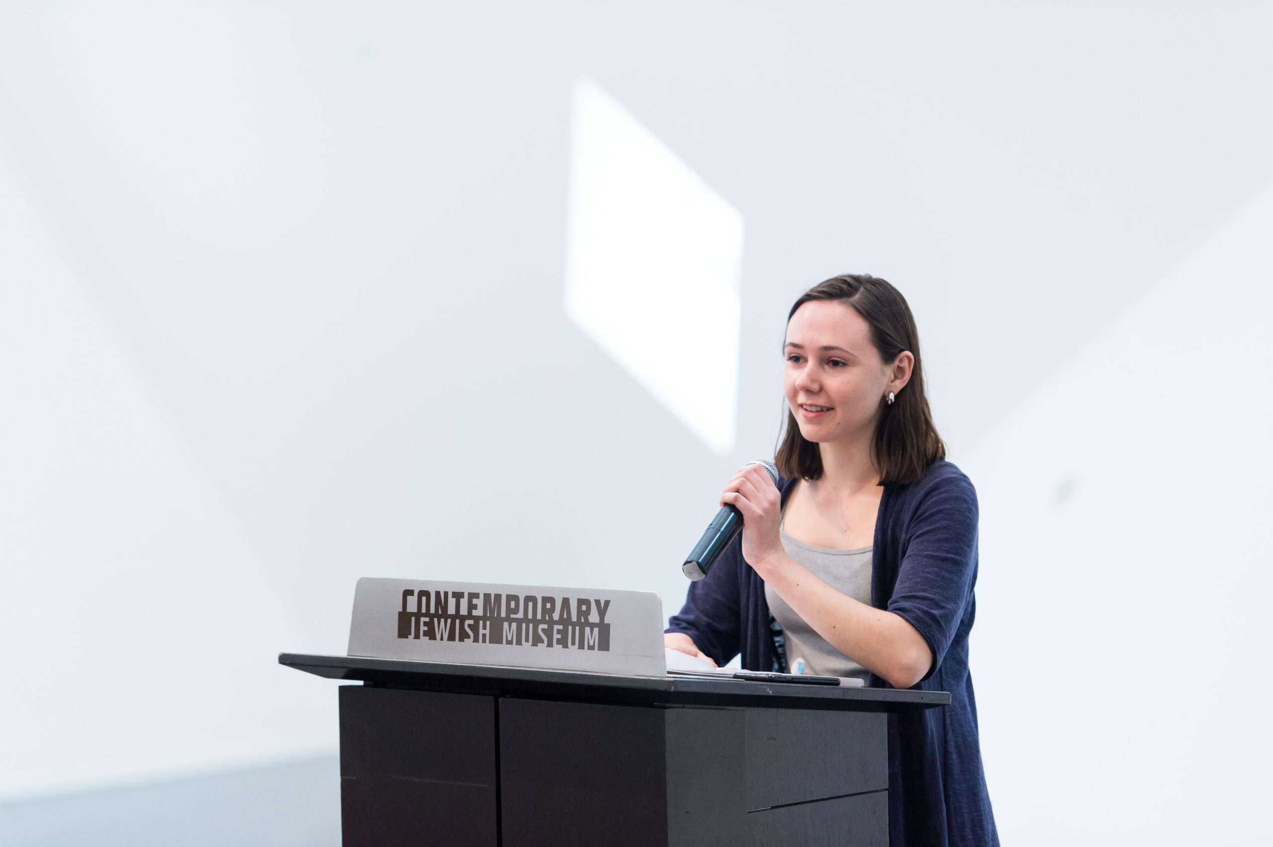 TAC squad member and <em>What We Hold</em> participant Elizabeth Levie speaks about her experience in creating audio stories at the opening reception. TAC squad member and <em>What We Hold</em> participant Elizabeth Levie speaks about her experience in creating audio stories at the opening reception.